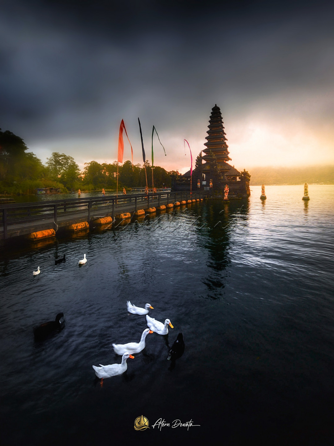 One of the best tourist attraction in Bali, Indonesia. <br />
The temple lacated on the lake of Batur Kintamani, so it's look like a flying temple on the lake. <br />
Te get here, you need to go by vehicle and take about 2 - 2,5 hours from Denpasar Air Port. 
